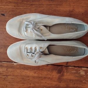 Metallic teal sneakers